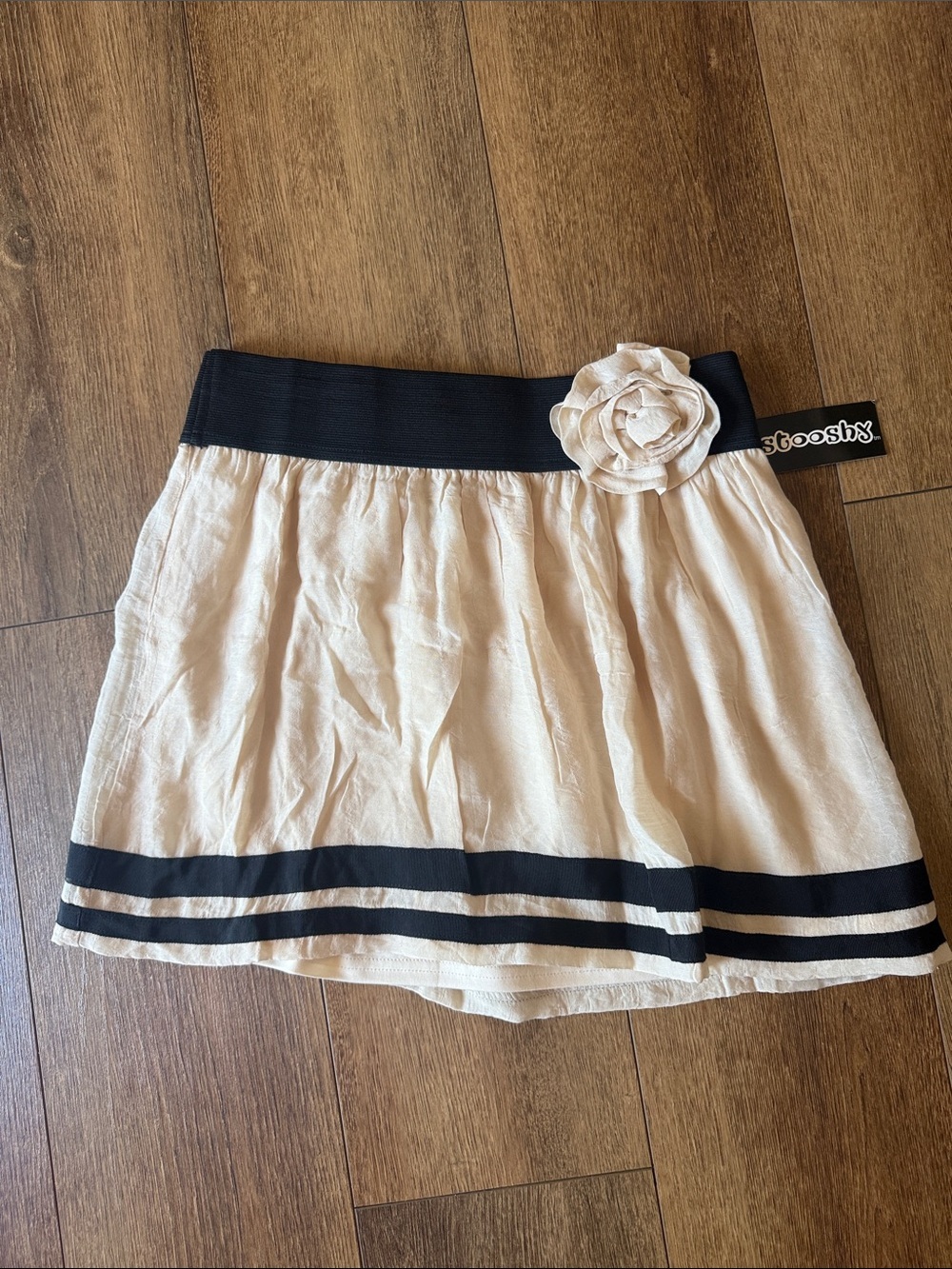 Stooshy Cream Mini Skirt with Black Waistband & Flower. Size S